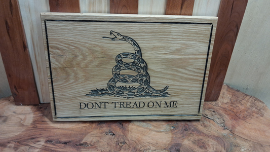 Rectangular wood-look plaque with engraved coiled snake and DON'T TREAD ON ME lettering